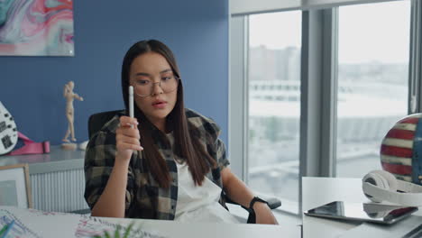 Contemplative-student-looking-solution-at-home-office.-Pensive-woman-thinking