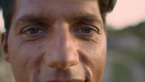 Wrinkled-man-smiling-camera-at-summer-nature-portrait.-Happy-model-eyes-looking