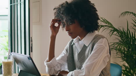 Remote-worker-surfing-laptop-sitting-cafe-close-up.-Woman-working-on-computer