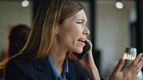 Upset-employee-talking-smartphone-close-up.-Frustrated-woman-discuss-project