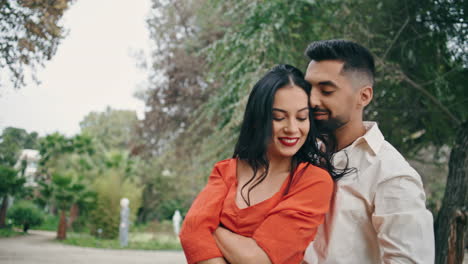 Sensual-partners-dancing-latino-dance-in-city-park-close-up.-Couple-enjoy-salsa.