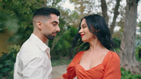 Hot-street-dancers-performing-latin-american-choreography-in-city-park-close-up