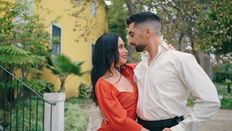 Two-professionals-performing-salsa-in-city-park.-Happy-couple-dancing-latino.