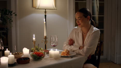 Relaxed-woman-eating-at-evening-date-restaurant.-Lady-enjoying-romantic-dinner