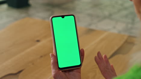 Closeup-woman-gesturing-chromakey-telephone-indoors.-Manager-talking-videocall