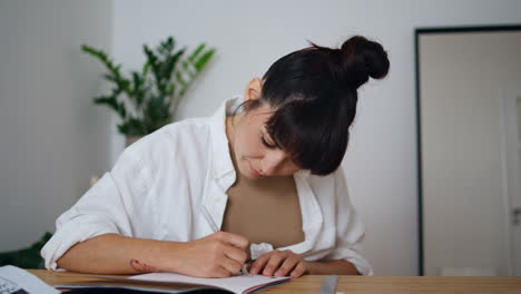 Creative-designer-drawing-pen-at-studio-close-up.-Talented-woman-using-ruler