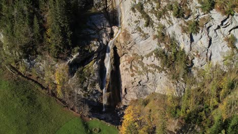 Aerial-Birds-Eye-View-Over-Sulzbachfall-waterfall-In-Switzerland