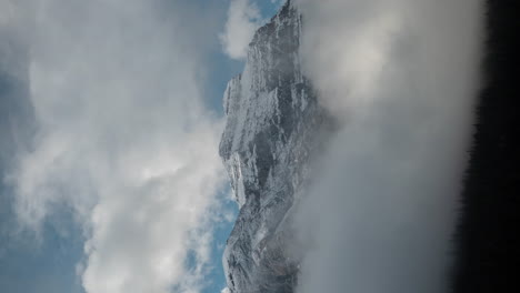 Vertical-4k-Time-Lapse,-Clouds-Inversions-Around-Snow-Capped-Mountain-Peak-in-Yoho-National-Park,-British-Columbia,-Canada