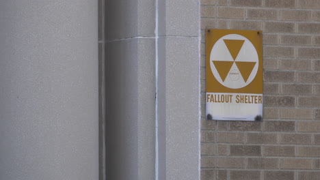 Civil-Defense-Fallout-Shelter-sign-on-facade-of-building