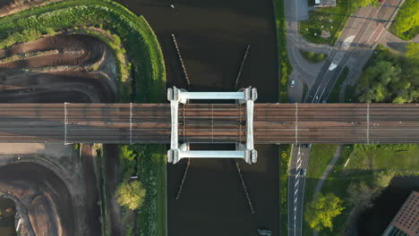 Topdown-View-Of-Vertical-Lift-Train-Bridge-Over-River-Gouwe-In-Gouda,-Netherlands