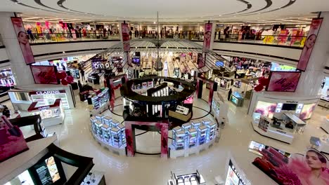 people-in-a-shopping-mall-during-the-"new-normal"-post-coronavirus-some-wearing-face-masks