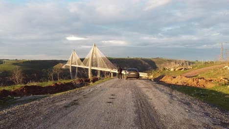 A-hauntingly-beautiful-drone-footage-of-the-Mohammed-VI's-bridge-in-morocco-followed-by-the-beauty-of-natural-elements-in-the-background-forming-a-pretty-combination-of-colors-and-atmosphere