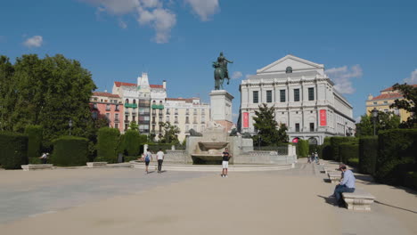 People-At-Plaza-de-Oriente-With-Monument-And-Fountain-of-Philip-IV-In-Madrid,-Spain