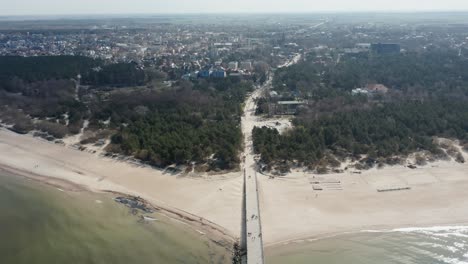 AERIAL:-Palanga-City-Panorama-with-Palanga-Pier-and-Rippling-Baltic-Sea-in-Bright-Morning