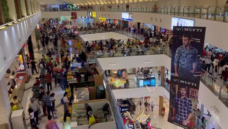 A-top-angel-shot-of-crowd-shopping-and-doing-window-shopping-inside-a-mall