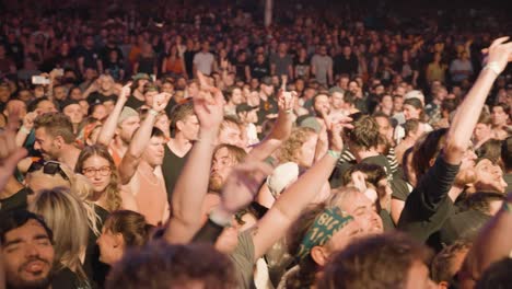 Fans-Singing,-Dancing,-And-Shouting-Inside-The-Budweiser-Stage-During-A-Live-Concert-Event-At-Night-In-Toronto,-Canada