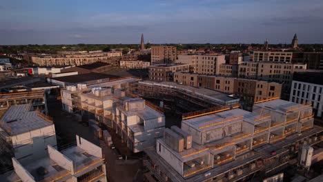 Slow-aerial-backward-movement-showing-PUUR21-urban-development-housing-project-in-different-initial-stages-of-construction