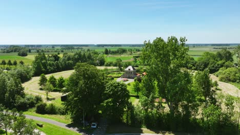 Slow-drone-approach-of-landmark-house-in-Zeeland,-Netherlands