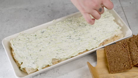 Close-up-Shot-Of-A-Individual-Preparing-Multiple-Sandwiches-By-Putting-The-Slices-On-Bread-Ontop-To-Complete-The-Sandwich