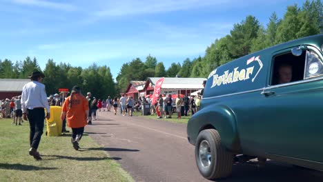 Spectators-Looking-at-Old-and-Unique-Cars-at-Motor-Festival,-Establishing-Shot