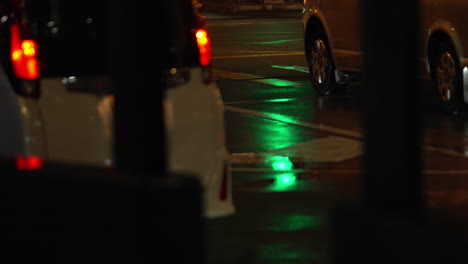 Hongkong--August-07,-2022:-peoples-at-night-walking-across-zebra-cross,-focus-on-feet