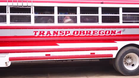 old-bus,-vintage-truck,-street-sign-san-juan-sur-streets,-nicaragua,-village-nicaraguanse,-coastal,-poverty,-managua