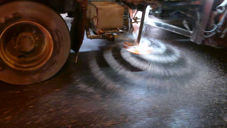 Salt-spreaders-at-work-at-night-in-the-city-road