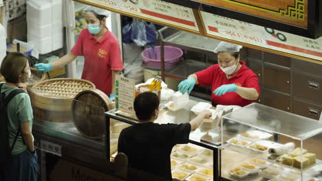 street-vendor-selling-food-for-taking-away-in-asiatic-chinese-metropolitan-area