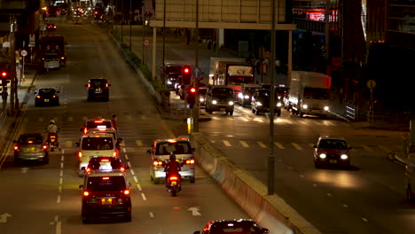 Busy-intersection-on-a-road-at-night-in-hon-Kong-City