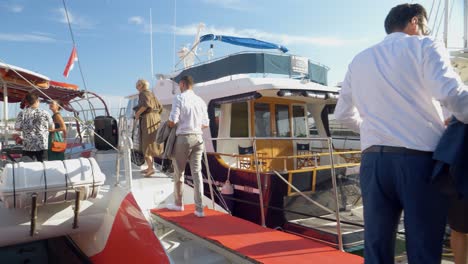 People-getting-on-a-Catamaran-boat-for-a-wedding-party-at-sea