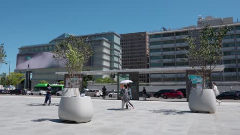 Renovated-Gwanghwamun-Plaza,-National-Museum-of-Korean-Contemporary-History-building-view,-people-walking-on-spacy-park-square-in-Seoul-downtown