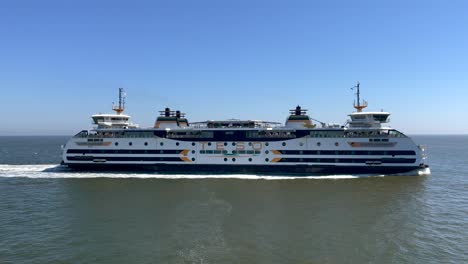 Wide-shot-showing-cruising-Teso-Ferry-between-Texel-Island-and-Den-Helder-during-sunny-day