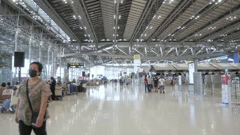 POV-inside-the-airport-departure-terminal-Suvannabhumi-Airport-at-Checkin-counter-without-passenger-while-covid-outbreak