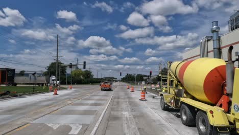 POV-truck-driving-slowly-on-a-road-that-is-undergoing-construction