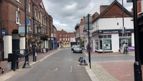 Walking-through-quaint-Godalming-High-Street-in-Surrey,-England