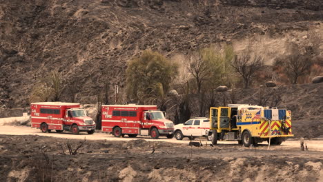 Fire-department-vehicles-trucks-engine-hose-resting-Fairview-fire-california-day