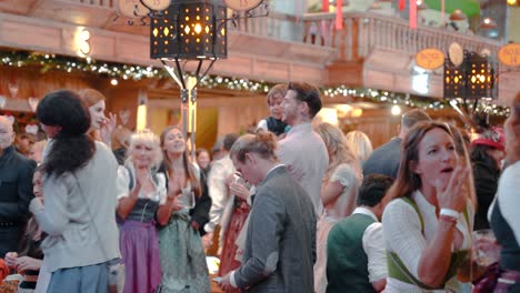 People-party-in-beer-tent-at-Oktoberfest-Munich