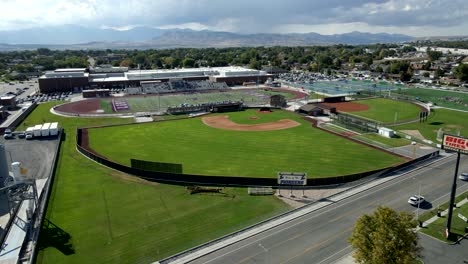 Sports-complex-at-a-small-town-high-school---aerial-flyover