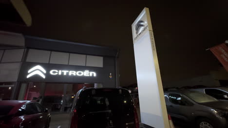 Citroen-car-dealership-and-forecourt-in-London-at-night-with-logo