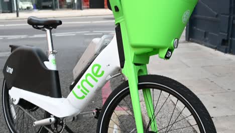 Close-up-view-of-a-Lime-Bike-within-Islington,-London,-United-Kingdom