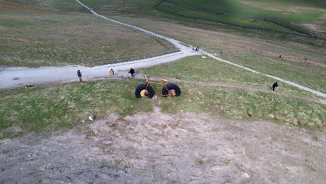 Tourists-At-Hanson-Aggregates-Quarry-With-Large-Bike-Sculptures-In-Harrogate,-North-Yorkshire,-England,-UK