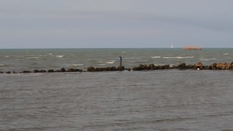 low-shot-of-waves-on-the-beach,-rembang,-central-java-on-September-18,-2022