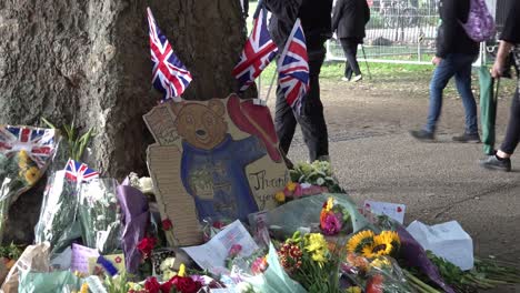 Paddington-Bear-painting-is-left-at-memorial-in-central-London,-UK