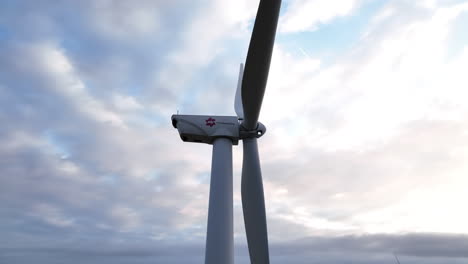 A-static-wind-farm-windmill-with-cloudy-pink-and-blue-sky