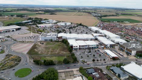 Dolly-forward-from-a-drone-over-Westwood-Cross-shopping-complex