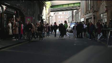 Busy-stroll-through-Borough-Market-within-London,-United-KIngdom