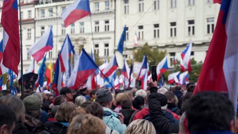 First-person-view-from-crowd-at-demonstration-in-Prague,-Czechia