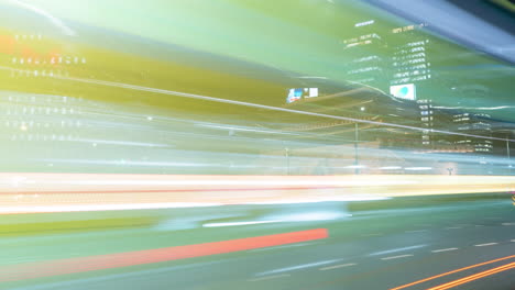 Panning-Night-time-lapse-of-Namdaemun-Gate-and-Busy-Seoul-City-Traffic-in-Downtown