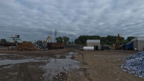 Construction-workers-working-with-big-machines-in-the-distance