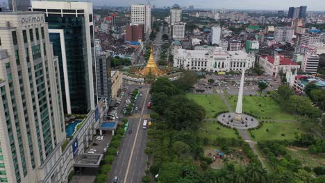 Flying-Drone-Over-Downtown-Yangon-City,-Biggest-City-In-Myanmar